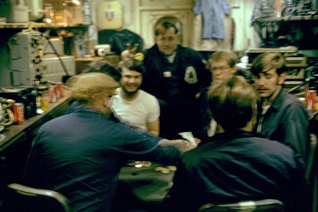 AIMD 5 poker game. Maxwell has back to camera, I believe I am sitting next to Maxwell, Kent Matouche, Ralston doing bunny ears t