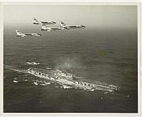 Four VF-24 F8U-2N Crusaders flying over the U.S.S. Midway, CVA-41, in March of 1962 - USN Photo