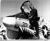 Capt. Clarke, then CO of VA-93 on the ladder of aircraft 301. Feb 1974