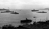 Early 1950 while Midway was in Istanbul. The other large ship is the heavy cruiser USS Newport News (CA-148). The destroyers are