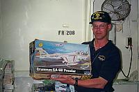 Troy in the curator's model storage room