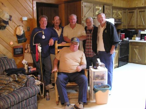 Setting; JJ Stringer -- Standing; Bill Millican, EW Martin, PE Millican, Doyle Watkins, and
Ralph Little.
This was taken in Foxw