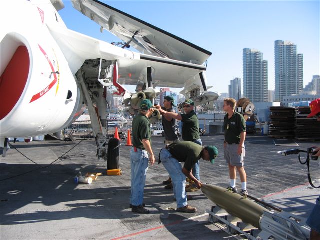 Green shirts humping ordnance - Frank Warren photo