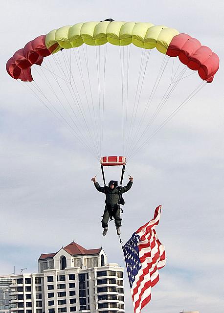 Skydiver preparing to land on flight deck [11-11-09] - Clint Griffin photo