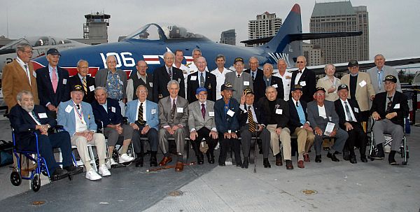 (MAY 2, 2007) - A group of the Battle of Midway survivors gather for a group photograph on the flight deck of the USS Midway Mus