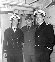 Ensigns Bill Doyle, Jerry Cohee, and Jerry O'Brien clowning around in the bunkroom called "Boys Town