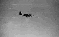 F2H Banshee from VC-62 passing by the ship
