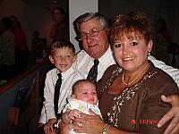 AJ (Fabio) Deese Midway Cat crew 59-63 with Wife, Jeanette and grandsons 2006