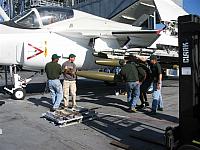 Green shirts humping ordnance - Frank Warren photo