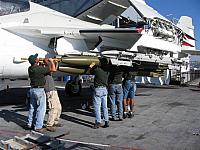 Green shirts humping ordnance - Frank Warren photo