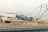 Barge with F4U approaching foot of Navy pier 11-11-09 - Clint Griffin photo