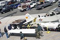 Off-loading wing from truck [03-09-10] - Clint Griffin photo