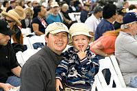 Father & son attending ceremony [5-23-09] - photo by Clint Griffin